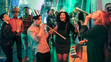 Group of friends celebrating while taking pictures at the World Famous Wax Museum Madame Tussauds New York