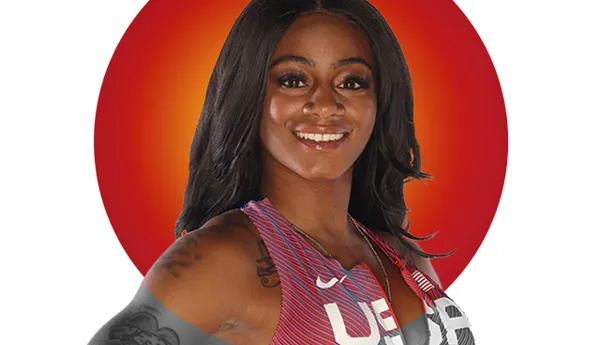 Portrait of athlete Sha’Carri Richardson with long, wavy black hair, wearing a Team USA track and field uniform. A vibrant red and orange circular background highlights her confident smile. Featured in Madame Tussauds' 'Hot 100' list.