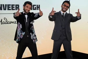 The Bollywood Indian actor and celebrity Ranveer Singh visited his own wax statue at Madame Tussauds, posing beside it with a smile on his face.  