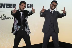 The Bollywood Indian actor and celebrity Ranveer Singh visited his own wax statue at Madame Tussauds, posing beside it with a smile on his face.