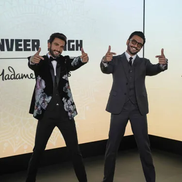 The Bollywood Indian actor and celebrity Ranveer Singh visited his own wax statue at Madame Tussauds, posing beside it with a smile on his face.