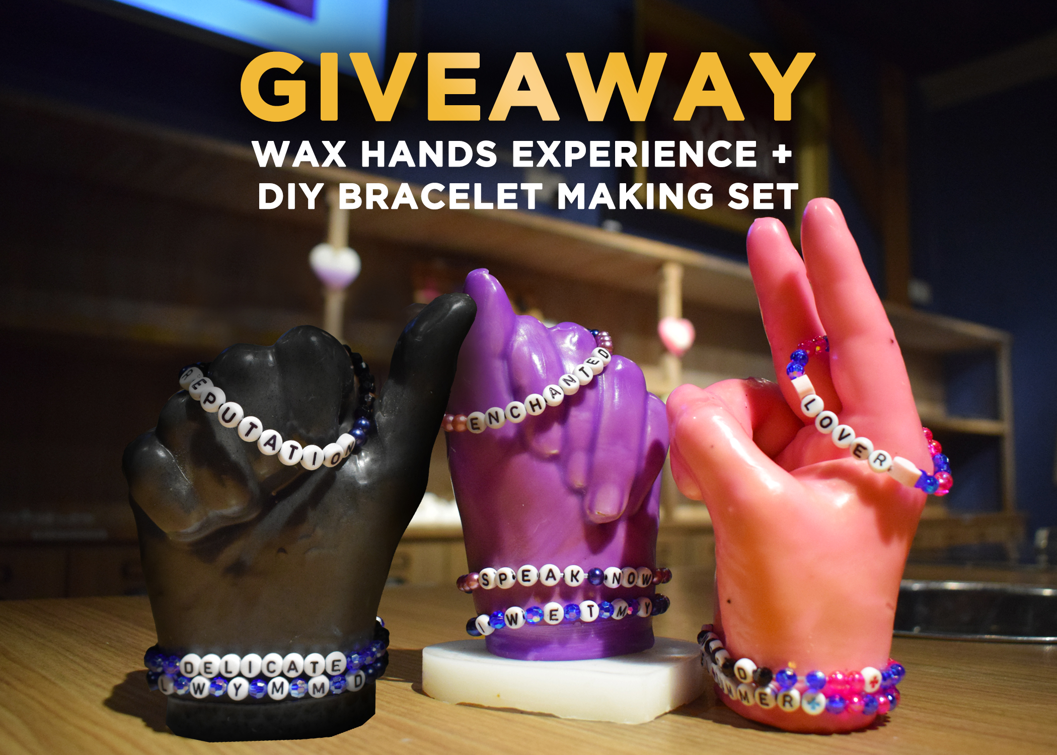 Wax Hands decorated with friendship bracelets of Taylor Swift's song lyrics