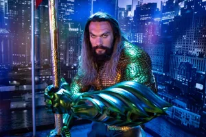 aquaman wax work in front of city