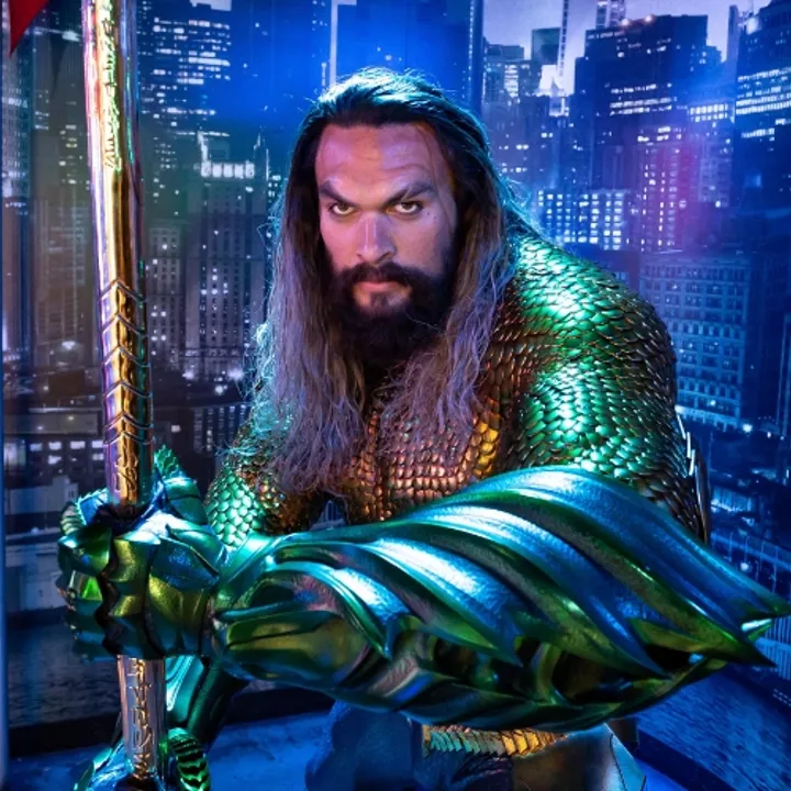 aquaman wax work in front of city