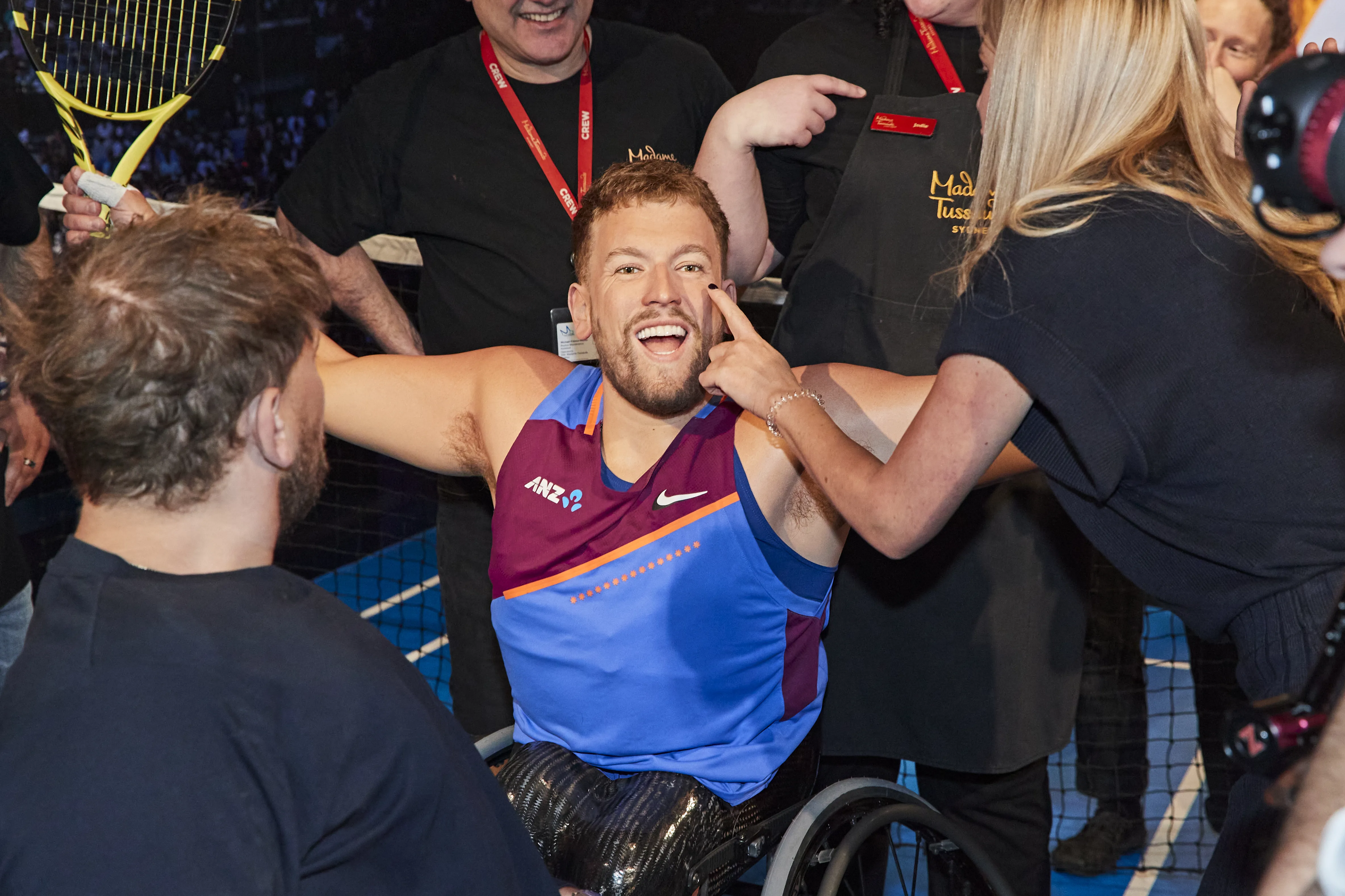 Dylan Alcott (AO) And Madame Tussauds Sydney Team Looking At Details Of Wax Dylan