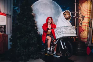 Boy Riding ET's Bike