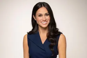 meghan markle smiling waxwork on white background