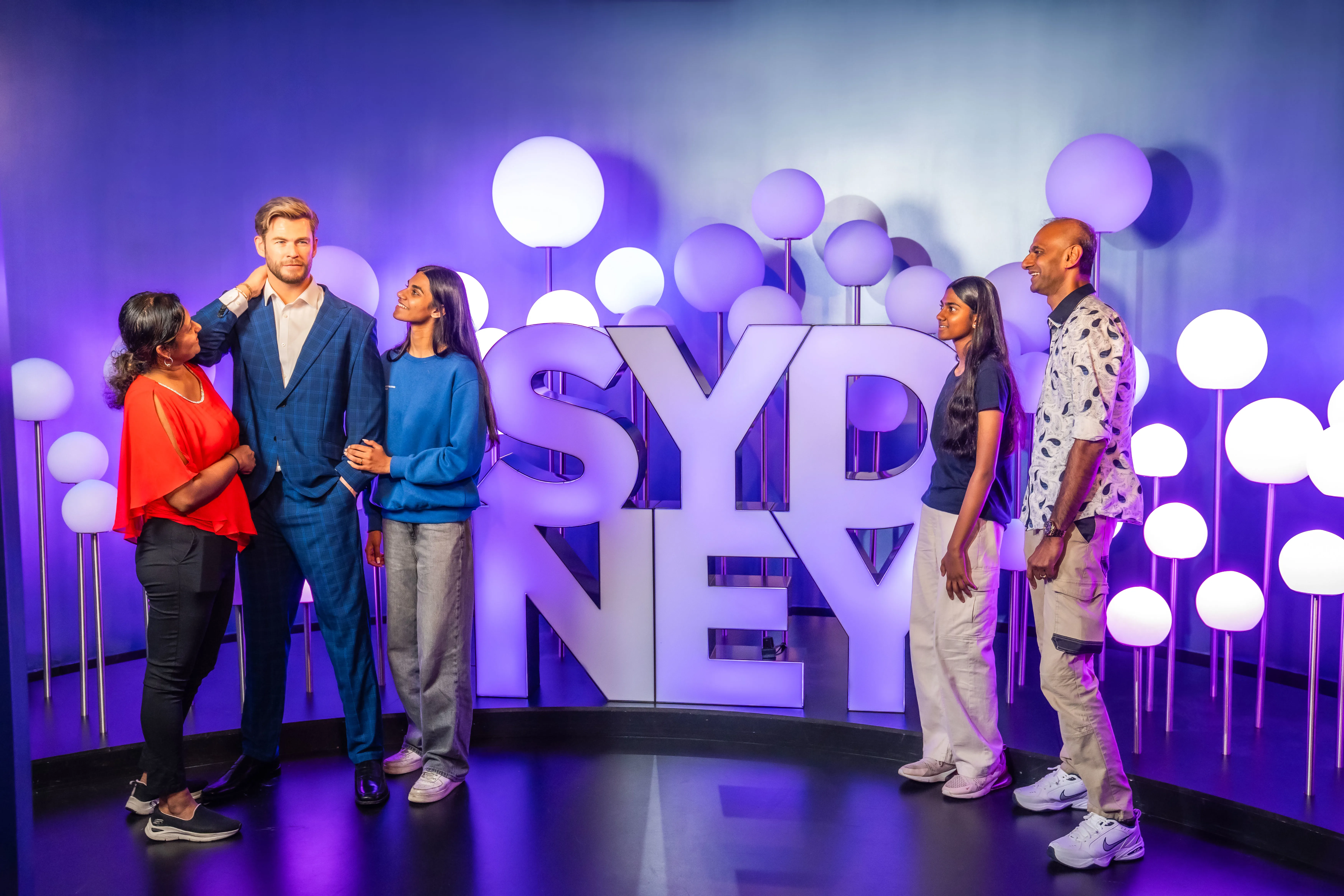 Madame Tussauds Sydney Guests Standing Next To Chris Hemworth And The SYDNEY Photo Opportunity