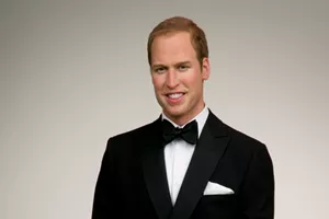 prince william wax figure on white background