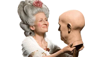 madame tussaud holding wax head
