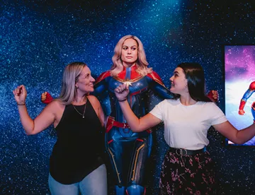 Captain Marvel With Two Guests