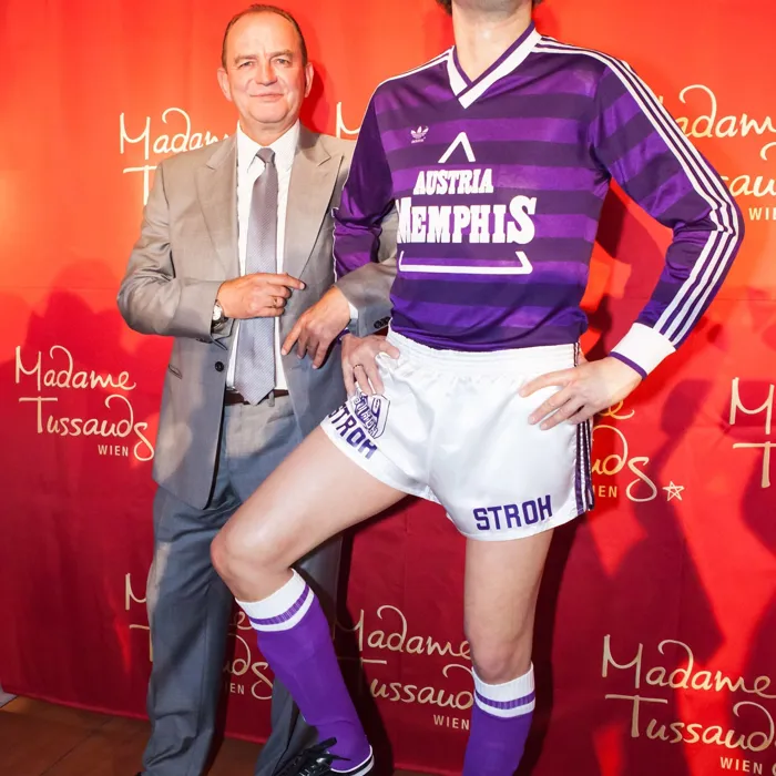 Herbert Prohaska next to his wax figure at Madame Tussauds™ Vienna