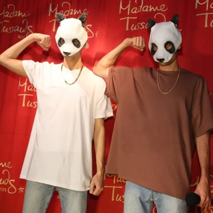CRO poses next to his figure at Madame Tussauds™ Vienna